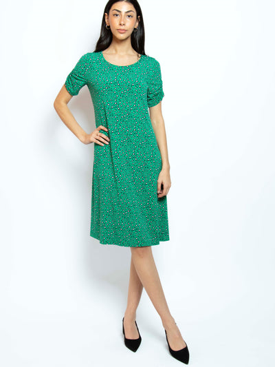 Women's animal print short sleeve dress with ruching in green