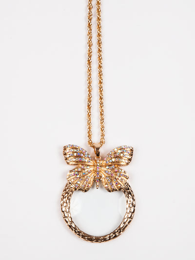Butterfly pendant necklace with magnifying glass in gold